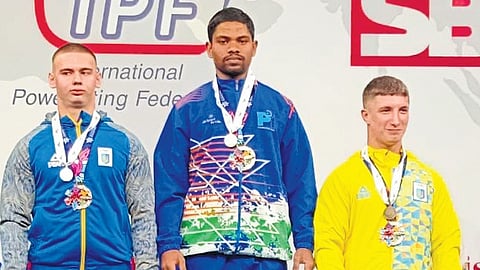 Modem Vamshi at the podium of the world powerlifting championships in Malta