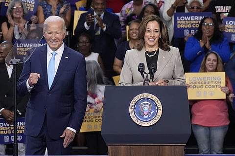  President Joe Biden, left, and Vice President Kamala Harris speak in Largo, Md., Aug. 15, 2024. 