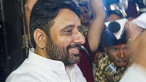 Aam Aadmi Party (AAP) MLA Amanatullah Khan being taken by the Enforcement Directorate after he was arrested in connection with alleged irregularities in appointments to the Delhi Waqf Board, at his residence, in New Delhi, Monday, Sept. 2, 2024. 