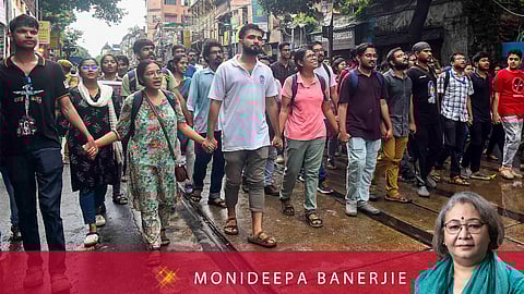 Protesting junior doctors march towards the police headquarters after they were allowed to meet Police Commissioner Vineet Goyal over the case of alleged sexual assault and murder of a trainee doctor in Kolkata.