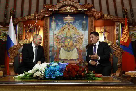 Russian President Vladimir Putin, left, and Mongolian President Ukhnaagiin Khurelsukh attend a meeting at the Saaral Ordon Government Building in Ulaanbaatar, Mongolia.