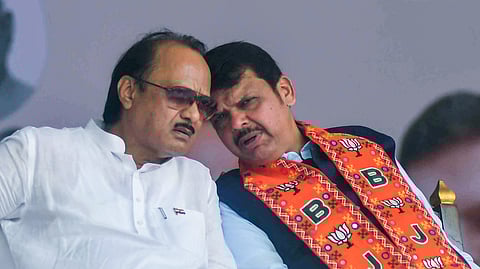 Maharashtra Deputy Chief Ministers Ajit Pawar (L) and Devendra Fadnavis (R)