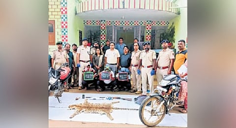 The three accused along with the leopard hide 