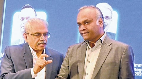 Minister Priyank Kharge with Infosys co-founder Kris Gopalakrishnan at Innoverge in Bengaluru on Wednesday
