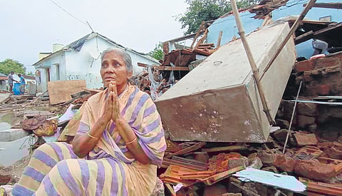 C Narasamma, a flood victim of Ravirala village, weeps after seeing her collapsed residence; (right) three acres of farmland submerged in floodwaters