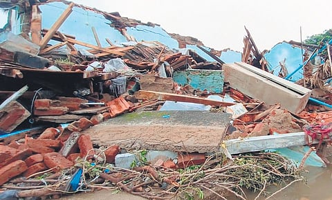 A view of a collapsed house at Ravirala village in Nellikudur mandal of Mahabubabad district on Thursday