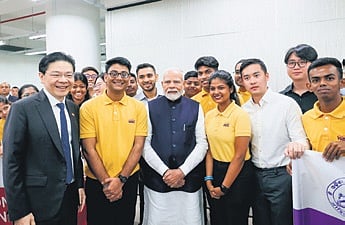 PM Modi and his Singapore counterpart Lawrence Wong with WSC interns