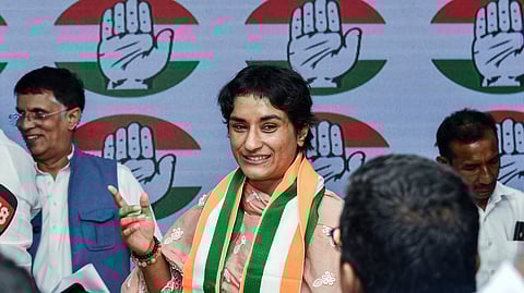 Wrestler Vinesh Phogat joins the Congress, at AICC headquarters in New Delhi on Friday.