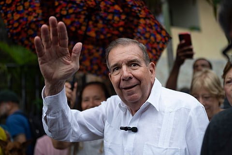 Venezuelan opposition presidential candidate Edmundo Gonzalez waves to supporters during a political event at a square in the Hatillo municipality of Caracas, Venezuela.