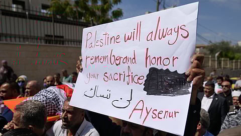 Mourners carry the body of Aysenur Ezgi Eygi, 26, who was fatally shot by Israeli soldiers while participating in an anti-settlement protest in the West Bank, during her funeral procession in the West Bank city of Nablus, Monday, Sept. 9, 2024.