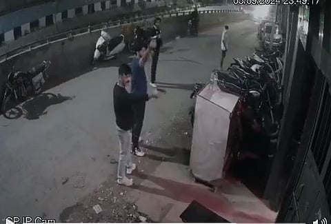 Eyewitnesses said that a female bouncer was held at gunpoint, with one of the attackers placing a firearm to her head.