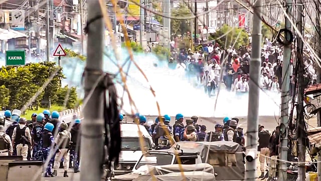 Security personnel fire tear gas shells during students' protest, Imphal.