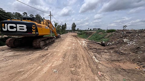 The illegal concrete road inside the Heelalige Lake premises.