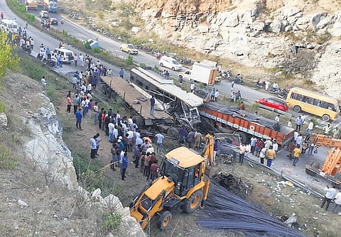 Mangled remains of the bus after the accident near Mogili ghat on Friday.