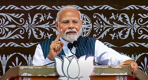 Prime Minister Narendra Modi addresses a public meeting ahead of the upcoming Jammu and Kashmir Assembly elections, in Doda district. 