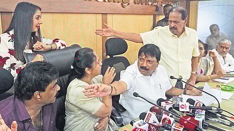 A heated argument breaks out between KFCC members and women commission chairperson Nagalakshmi Choudhary in Bengaluru on Monday | Allen Egenuse J