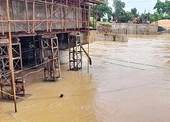 The under-construction bridge over river Jalaka in Mathani of Basta block 