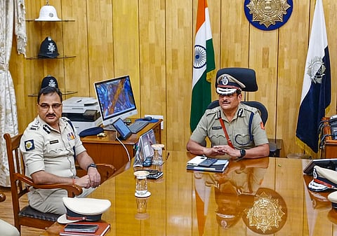 FILE - A poster hangs at the protest site as junior doctors continued their 'cease work' and sit-in demonstration against the RG Kar Hospital incident for the third consecutive day, outside Swasthya Bhavan in Kolkata, 