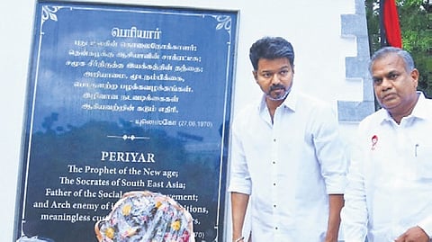 Vijay paying floral tributes to the statue of Periyar