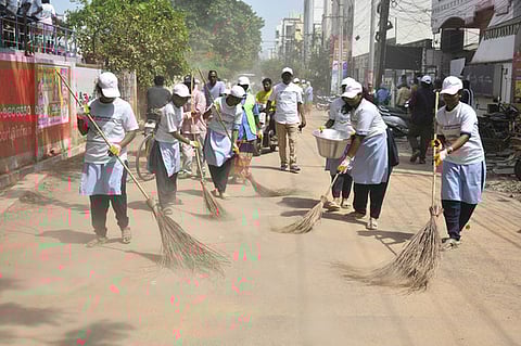 Nellai councillor attends council meeting in sanitation workers' attire to protest outsourcing recruitment