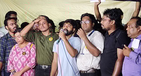 Junior doctors speak to the media after meeting with West Bengal Chief Minister Mamata Banerjee, near Swasthya Bhawan in Kolkata, Tuesday early morning, Sept. 17, 2024.