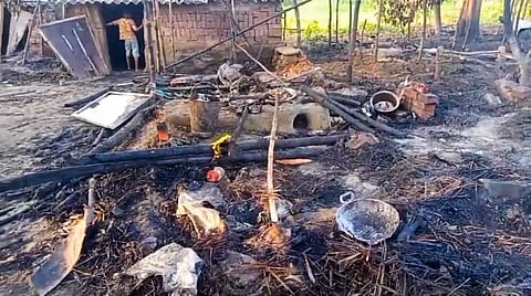 Charred remains are seen after multiple houses were allegedly set on fire, in Nawada district, Bihar