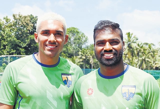 T’Puram Kombans skipper Patrick Mota with mindfielder Seesan S