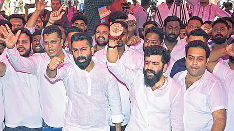 Youth Congress members protest against BJP MLA Munirathna at Freedom Park in Bengaluru on Friday