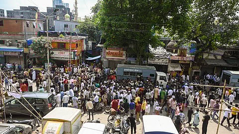 Locals protest BMC move to demolish a mosque in Dharavi, Mumbai. 