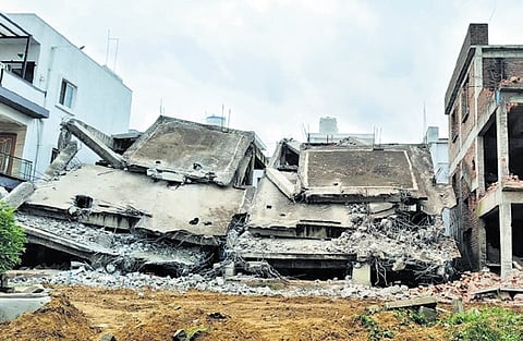 File picture of a demolished building in Katwa Cheruvu  