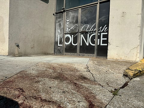 Blood stains were visible on the sidewalk outside of a nightclub in Birmingham, Ala. on Sunday, Sept. 22, 2024, after a mass shooting took place.