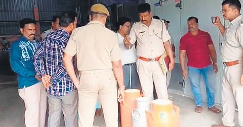 Police raiding the adulterated milk processing unit on Monday