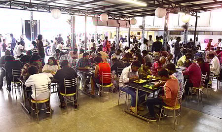 Customers are being served by the employees of the Samridhi@kochi hotel. 