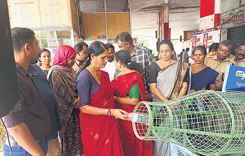 Alappuzha municipality chairperson K K Jayamma inaugurating the bottle booth at the KSRTC bus station as part of the waste-free KSRTC campaign. The corporation will replicate the initiative in its depots across the state in a phased manner
