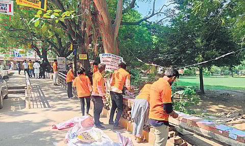 ABVP supporters cleaning the campus of campaigning material at Delhi University 
