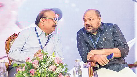 Dr Krishna Ella, chairman and managing director of Bharat Biotech International Ltd, engaged in a conversation with Industries Minister P Rajeeve at the BioConnect 2.0 conclave in Thiruvananthapuram on Friday