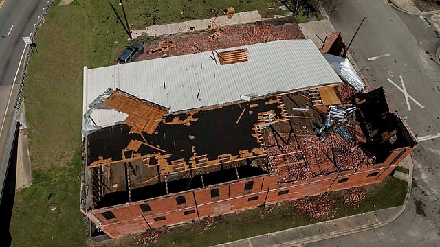 The business Chez What is seen after of Hurricane Helene moved through the area Friday, Sept. 27, 2024, in Valdosta, Georgia.