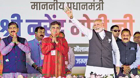 PM Narendra Modi with J&K BJP chief Ravinder Raina in Jammu.