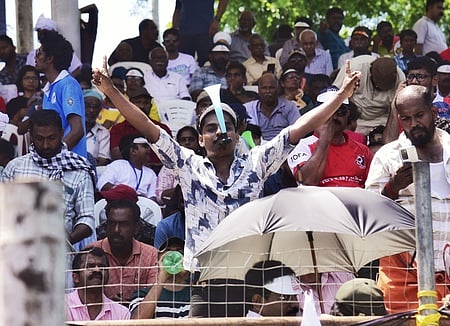 A man whistling the Vuvuzela used for representation