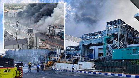 Smoke rises from the chemical godown of the electronics component factory of Tata Electronics Pvt Ltd in Hosur.