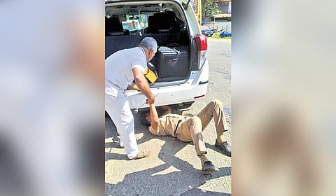  Justice Devan Ramachandran escapes unhurt after car tyre bursts in pothole in Thrissur