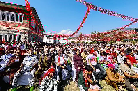 Jammu and Kashmir National Conference (JKNC) supporters attend a public rally addressed by party Vice President Omar Abdullah (Unseen) for the Jammu and Kashmir Assembly Elections, in Baramulla on Sunday. 