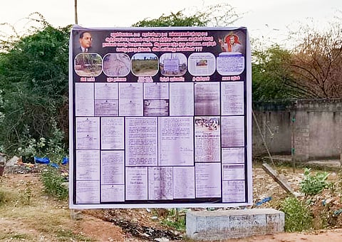 The banner with printed copies of over 15 petitions submitted to the CM’s cell and district administration 