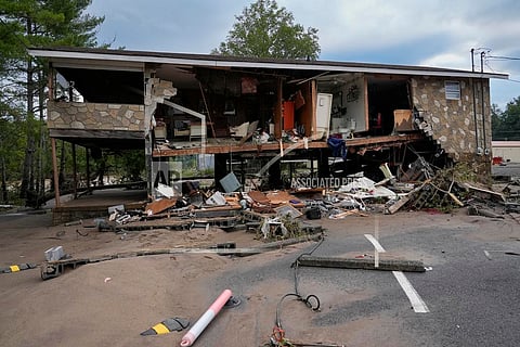 A flood damaged building left by tropical depression Helene is seen in Newport, Tenn., Saturday, Sept. 28, 2024. (AP Photo/George Walker IV)
