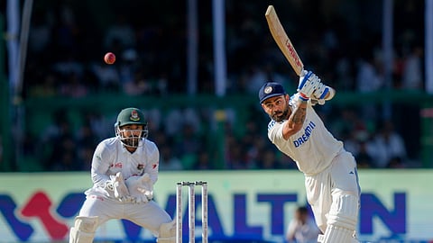 Virat Kohli plays a shot during the fourth day of the 2nd Test cricket match between India and Bangladesh, in Kanpur