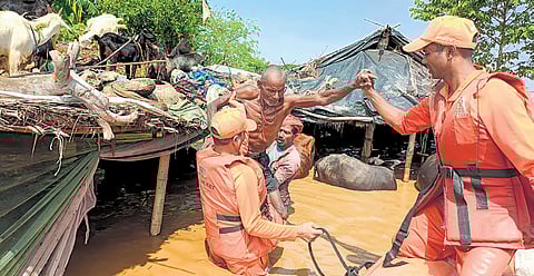 NDRF personnel rescue people in Bihar’s Supaul.