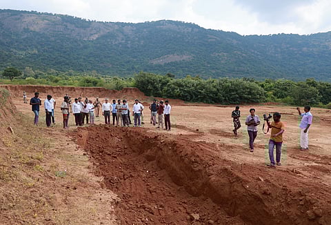 The team inspecting brick kilns and land dug for red sand mining in Alandurai and Vellimalaipattinam on Sunday.