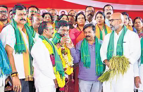 BJLP leader Alleti Maheshwar Reddy drinks juice offered to him ending the 24-hour hunger strike at Dharna Chowk in Hyderabad on Tuesday