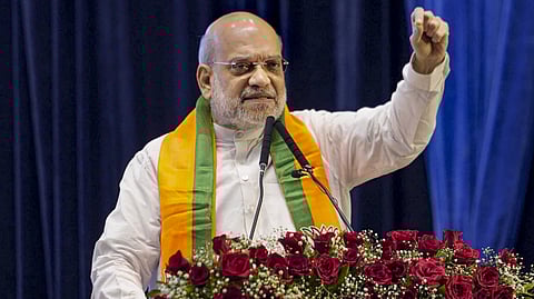Union Home Minister Amit Shah addresses BJP workers during the BJP cadre dialogue meeting in Mumbai, Oct. 1, 2024.