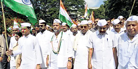 Chief Minister Siddaramaiah, Deputy CM D K Shivakumar, ministers and Congress leaders take out a march from Gandhi Bhavan to Vidhana Soudha on the occasion of Gandhi Jayanti on Wednesday.